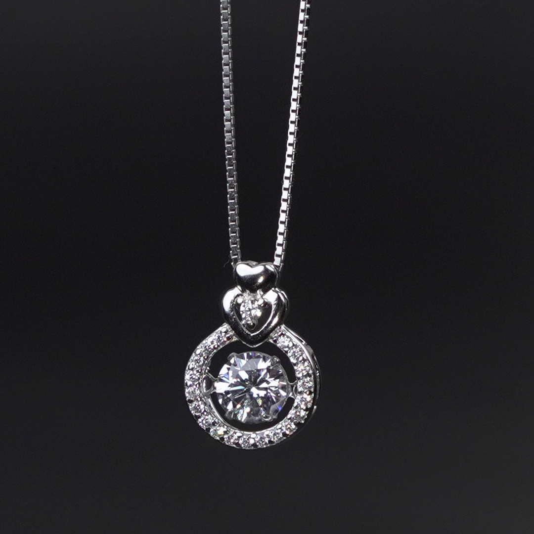 Sterling Silver Round Pendant with Moving Zircon Stone