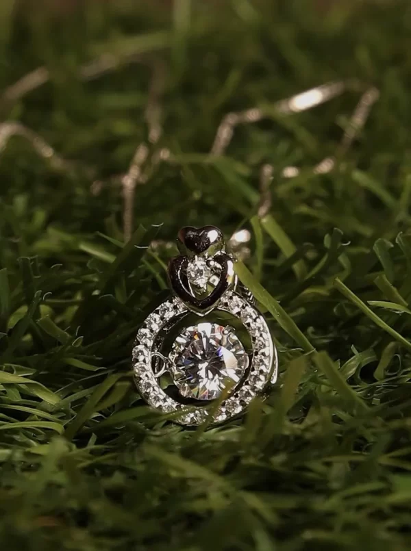Sterling Silver Round Pendant with Moving Zircon Stone - Image 3